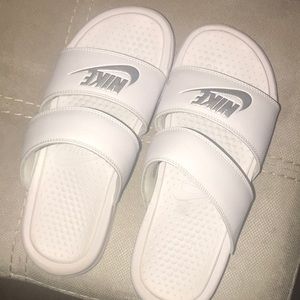 White Nike slides